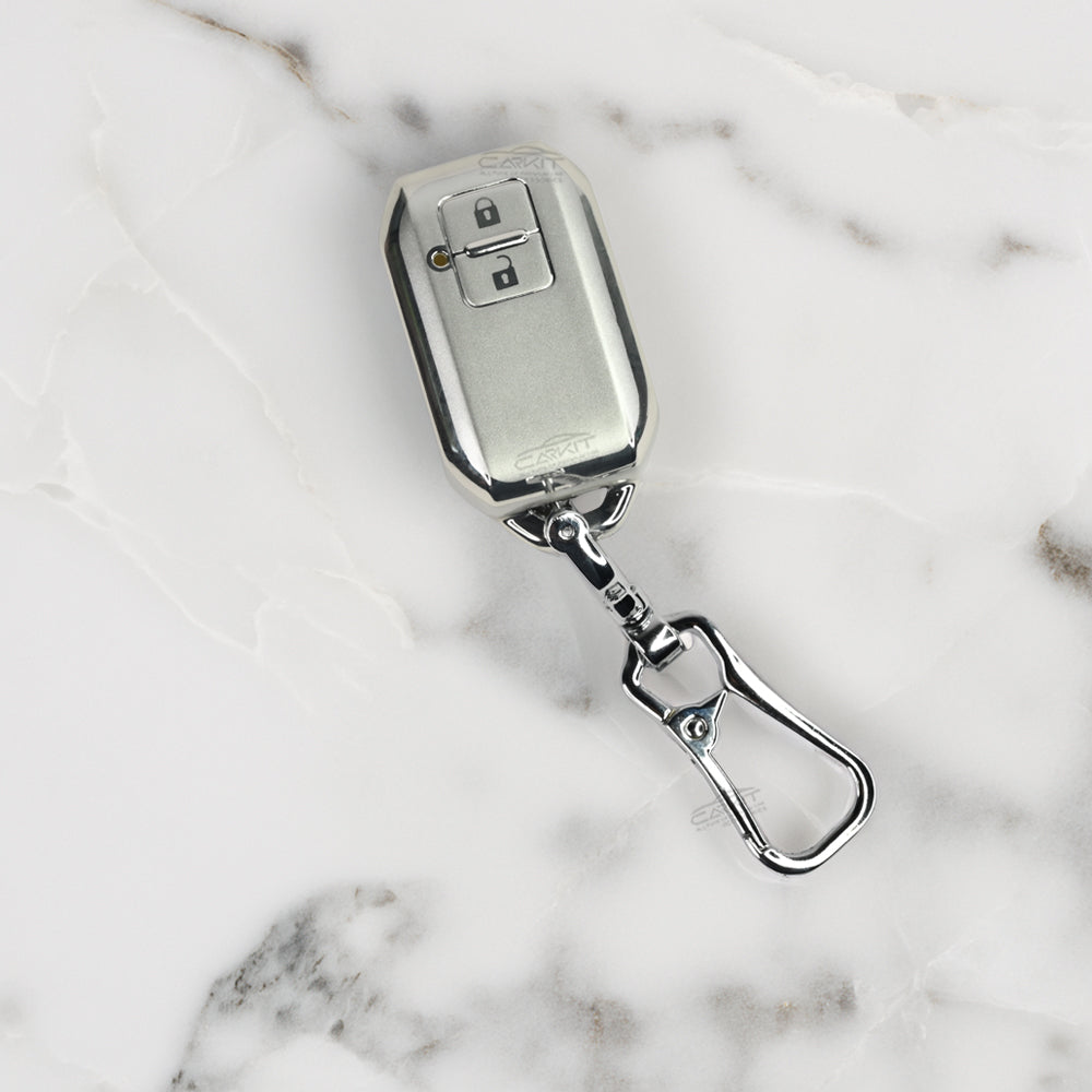 TPU Silver Car Key Cover For  Suzuki : Swift, DZire, Baleno, Ertiga, Grand Vitara, Brezza, Fronx, Jimny XL6, Ignis, Toyota: Glanza, Urban Cruiser Hyryder, Rumion 2 button smart key.