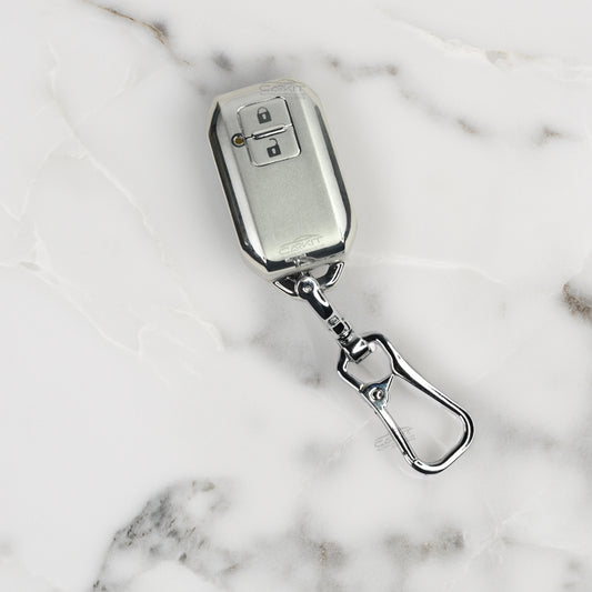 TPU Silver Car Key Cover For  Suzuki : Swift, DZire, Baleno, Ertiga, Grand Vitara, Brezza, Fronx, Jimny XL6, Ignis, Toyota: Glanza, Urban Cruiser Hyryder, Rumion 2 button smart key.