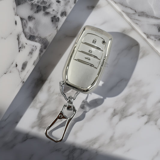 TPU Silver Key Cover For Toyota: Innova, Fortuner, Legender, Land Cruiser, Suzuki Invicto 3 button smart key.